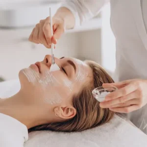 cosmetologist-doing-face-treatment-applying-face-mask_1303-28042_8_11zon